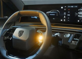 Цілком таємно: салон нового Peugeot 5008 розсекретили на відео Peugeot E-5008
